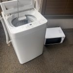 千葉県佐倉市での不用品回収の作業写真（洗濯機、電子レンジ）
