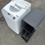 千葉県松戸市での不用品回収の作業写真（テレビ台、洗濯機）