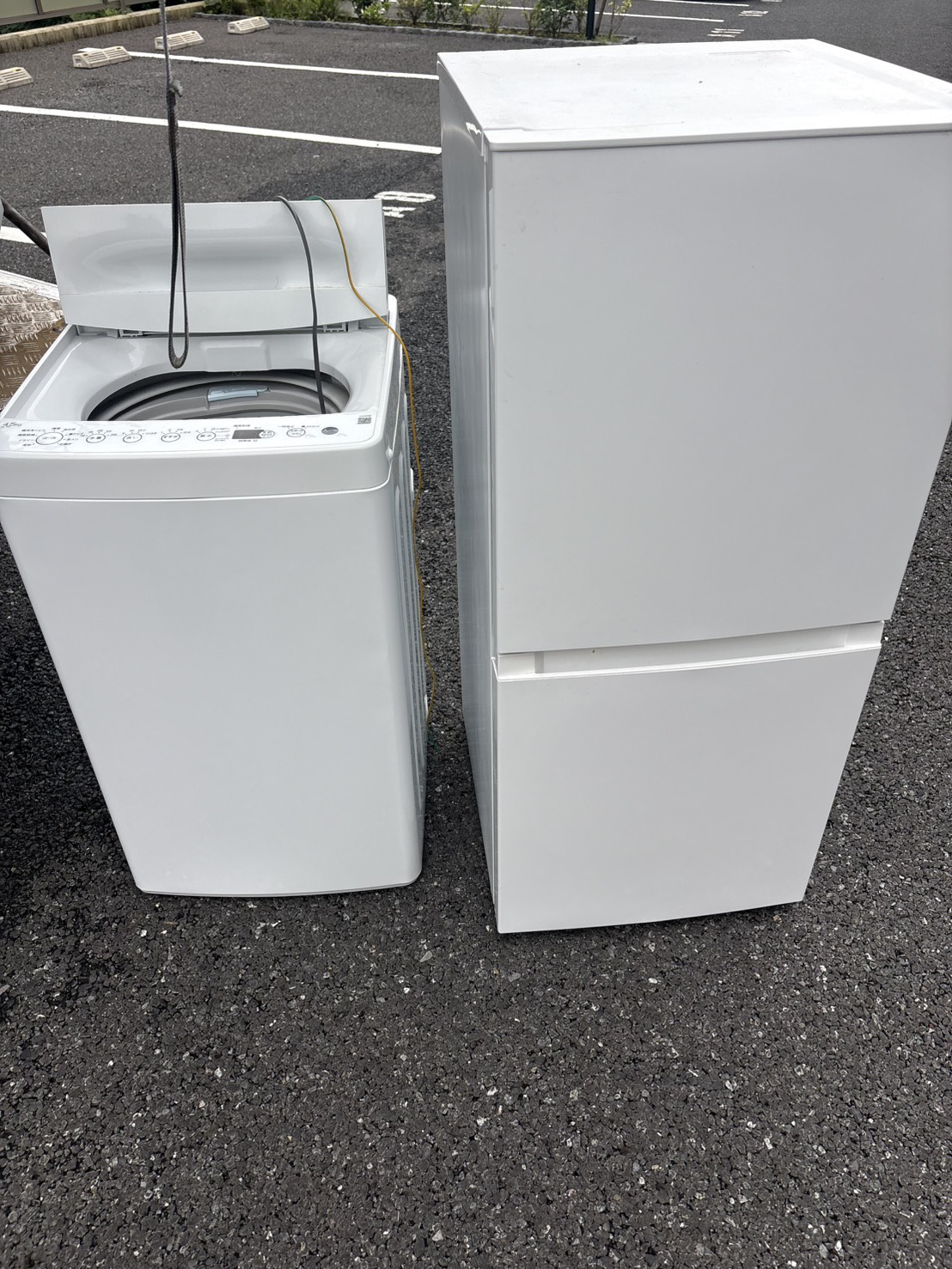 千葉県柏市での不用品回収の作業写真（洗濯機、冷蔵庫）