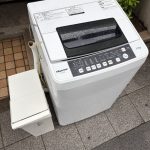 千葉県習志野市での不用品回収の作業写真（洗濯機、ゴミ箱）